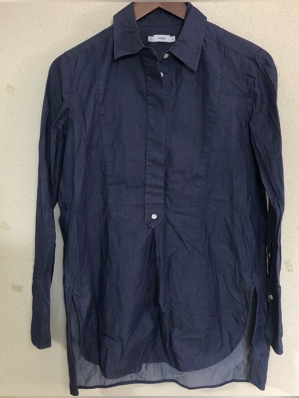 Vince denim blue bib-front long-sleeve tunic shirt with a high-low hem. Size XS